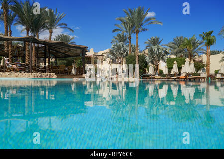 Sharm El Sheikh, Egypt - February 9, 2019: Five-star The Grand Hotel with palms and swimming pool in summer Stock Photo
