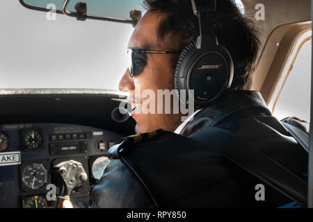 Nepal, aviation, pilot of domestic Dornier 228 aircraft on Tara Air domestic flight to Lukla Stock Photo