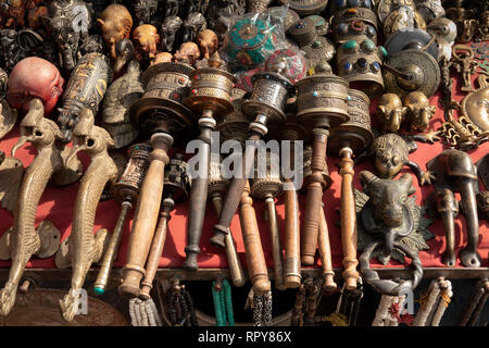 Nepal, Kathmandu, Swayambhunath Temple, antique and modern reproduction Buddhist artifacts for sale in souvenir shop Stock Photo