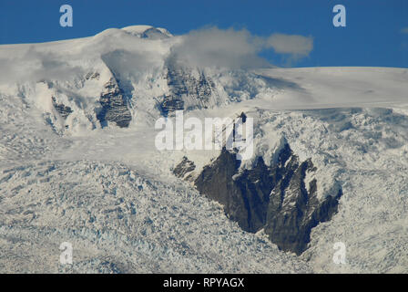 Snow covered mountain tops, which are well over 15,000 feet high, in the Wrangell St. Elias National Park, Alaska, USA. Stock Photo