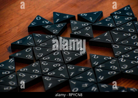 Close up of in progress table game on deep grain wooden table Stock Photo