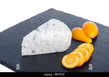 Pieces of blue cheese on black stone plate. Studio Photo Stock Photo