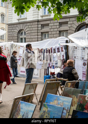 The souvenir market on Vicheva Square in the old town of Lviv, in Ukraine. Stock Photo
