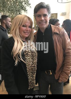 Hollywood, California, USA. 21st Feb, 2019. I16033CHW.Doris Bergman's Eleventh Annual Valentine Romance Oscar Style Lounge & Party .Fig & Olive, West Hollywood, California, USA .02/21/2019 .ESAI MORALES AND GLORIA KISEL - FOUNDER OF BRENTWOOD & PACIFIC PALISADES INTERNATIONAL FILM FESTIVALS . © Clinton H.Wallace/Photomundo International/ Photos Inc PACIFIC PALISADES INTERNATIONAL FILM FESTIVALS . © Clinton H.Wallace/Photomundo International/ Photos Inc Credit: Clinton Wallace/Globe Photos/ZUMA Wire/Alamy Live News Stock Photo