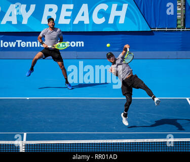 Delray Beach, Florida, USA. 23rd Feb, 2019. Jamie Cerretani (right), of the United States, hits an overhead, as Marcelo Arevalo (left), of El Salvador, follows the action, during their seminal doubles match against Bob and Mike Bryan, of the United States, at the 2019 Delray Beach Open ATP professional tennis tournament, played at the Delray Beach Stadium & Tennis Center in Delray Beach, Florida, USA. The Bryan brothers won 6-3, 7-5. Mario Houben/CSM/Alamy Live News
