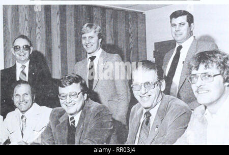 . Agri-news. Agriculture. April 16, 1984 FOR IMMEDIATE RELEASE FIRST PERMANENT BUILDING AT ALBERTA 4-H CENTRE NOW UNDER CONSTRUCTION. Smiling 4-H'ers pause during the recent contract signing ceremony in Red Deer for the construction of the first permanent structure at the Alberta 4-H Centre at Battle Lake. Signators were, seated left to right, 4-H Foundation of Alberta building committee chairman, Bob Boulton; construction contractor, Allan Johannson; past-president of the Alberta 4-H Council, Harold Anderson; and construction supervisor, Ike Johannson. Witnessing the signing were 4-H Foundati Stock Photo