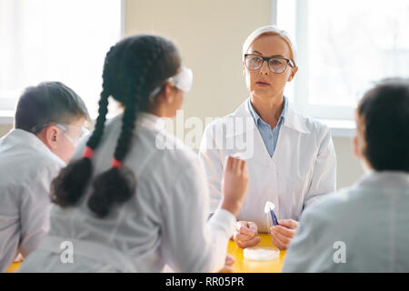 Discussing chemicals Stock Photo