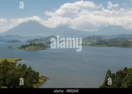 Lake Mutanda with views of volcanoes of the Virunga Mountains, Uganda Stock Photo