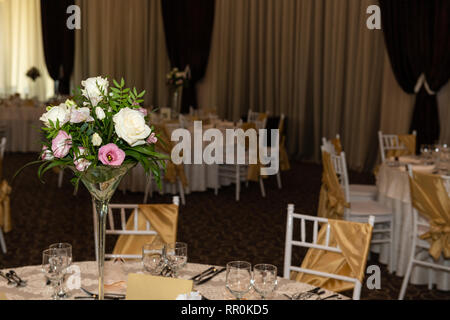 Floral centerpiece at luxury, elegant wedding reception table arrangement in banquet hall. Stock Photo