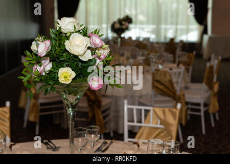 Floral centerpiece at luxury, elegant wedding reception table arrangement in banquet hall. Stock Photo