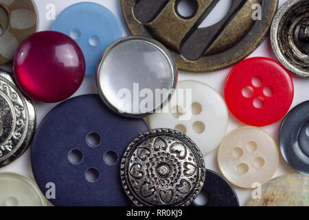 Macro view of buttons and fasteners with assorted colors and textures Stock Photo