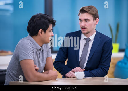 Portrait Of a two young Successful Businessmen Entrepreneur At  startup Office Stock Photo