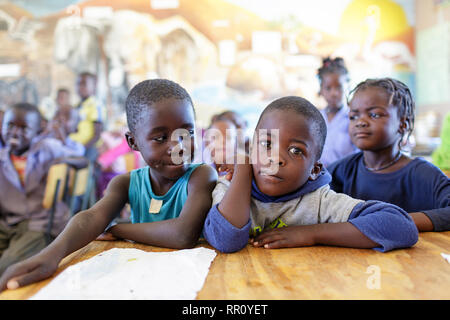 Children in a crowded classroom in a village school, Namibia, Purros. Stock Photo