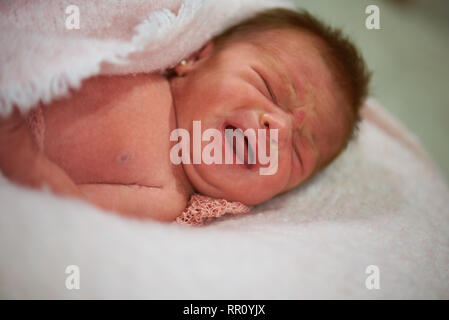 Newborn baby cry having colic close up portrait Stock Photo