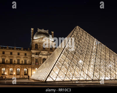 The old Louvre Museum and new Pyramid designed by Pei, Paris, France France. Stock Photo