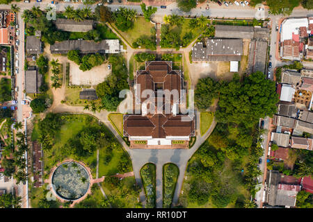 (view from above) Stunning aerial view of the beautiful Haw Pha Bang Temple and the Royal Palace National Museum in Luang Prabang, Laos. Stock Photo