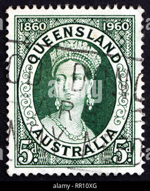 AUSTRALIA - CIRCA 1960: a stamp printed in the Australia shows Queen Victoria, Centenary of the first Queensland Stamps, circa 1960 Stock Photo