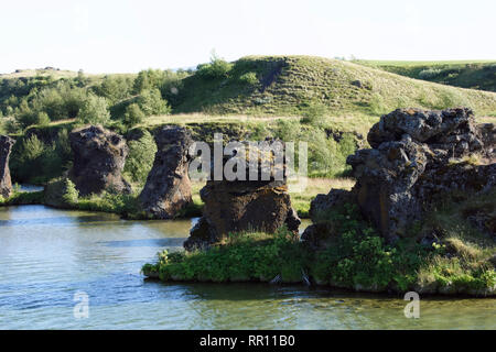 Scenic View Of Volcanic Landscape At Dimmuborgir Against Sky Stock Photo