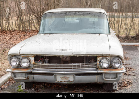 Front end of an old abandoned Cadillac Stock Photo
