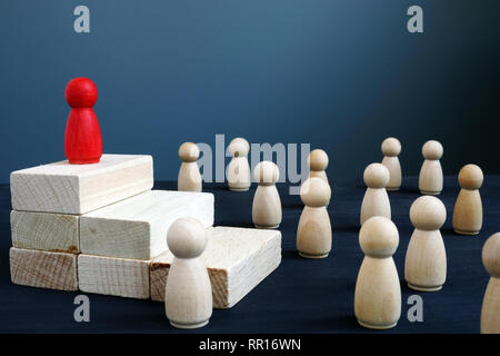 Leadership, hierarchy in the team and management. Successful leader concept. Stock Photo