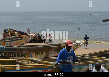 Artisanal pirogues at the beach of Djiffère, Senegal Stock Photo