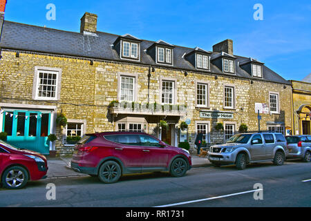 A general street view of the High Street in Cowbridge with the historic Bear Hotel in the Winter sunshine.High Street. Vale of Glamorgan,South Wales Stock Photo