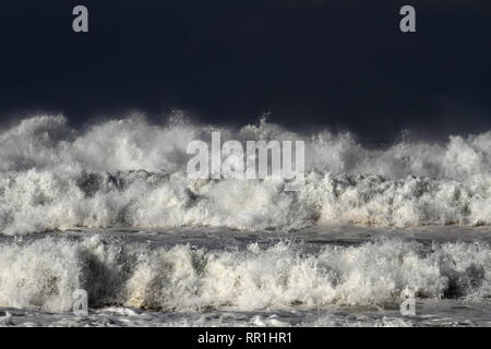 Detailed view of beautiful big crashing waves in a stormy day Stock Photo