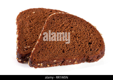 Two slices of black bread with sesame seeds isolated on white background Stock Photo