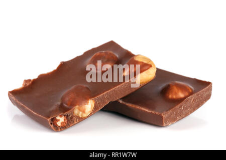 Chocolate with hazelnuts isolated on white background Stock Photo