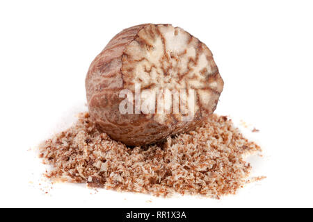 one nutmeg and powder isolated on white background Stock Photo