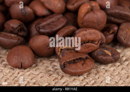 coffee beans on sackcloth close-up macro Stock Photo