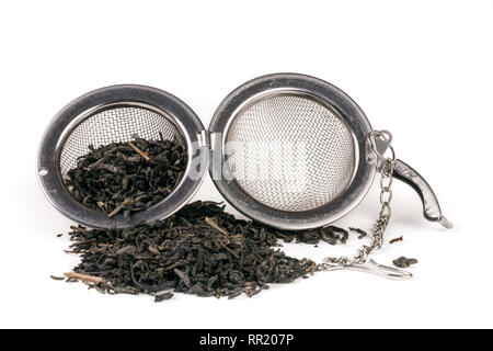 tea strainer on a chain isolated white background Stock Photo