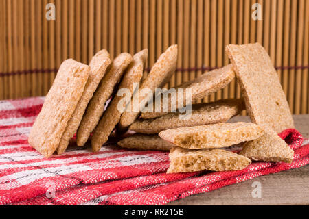 stack of crisp bread on a wooden table Stock Photo