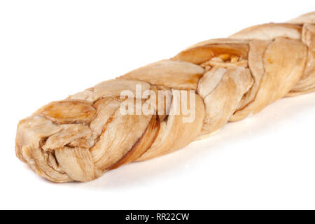 Dried melon in the form of pigtails isolated on white background Stock Photo