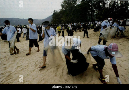 . After the Tsunami: Rapid Environmental Assessment. . Phuket. Thailand (5 January 2005). Hundreds of volunteers clean Patong beach in Phuket a week after the tsunami. With continued strong cooperation, the countries of the Indian Ocean can establish a course towards recovery that benefits people and the environment. © Pornchai Kittiwongsakul/AFP/Getty Images 1.3 Recommendations Reconstruction and restoration begins now. Mainstreaming environmental concerns is a prerequisite for sustainable reconstruction. Environmental management should always take as its point of departure the need to involv Stock Photo