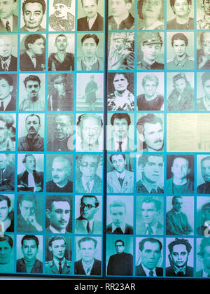 Portraits of victims inside the Memorial of the Victims of Communism and of the Resistance, located in a former prison used by the communist regime to Stock Photo