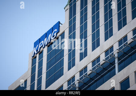 Kpmg KPMG logo on a tall office building next to the main station. One of ...