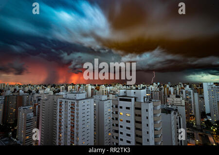 Impressive lightning at sunset during a thunderstorm in Sao Paulo Stock Photo