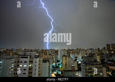 Impressive lightning at sunset during a thunderstorm in Sao Paulo Stock Photo