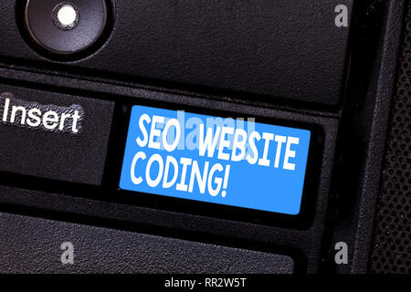 Conceptual hand writing showing Seo Website Coding. Business photo showcasing create site in way make it more visible to search engine Keyboard key In Stock Photo