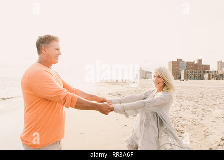 Beautiful happy senior couple dating outdoors - Youthful married couple having fun and enjoying life together Stock Photo