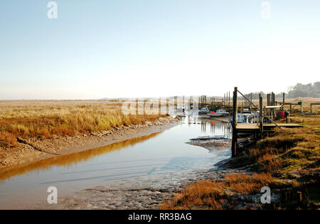 A view of the harbour and quayside in North Norfolk at Thornham, Norfolk, England, United Kingdom, Europe. Stock Photo