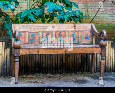 beautiful vintage bench in egyptian style, Seat decorated with symbols, historical looking objects Stock Photo