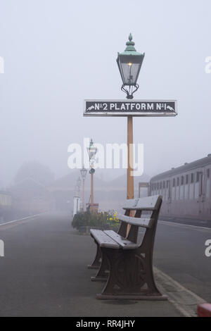 Kidderminster, UK. 24th February, 2019. UK weather: despite thick morning fog across Worcestershire, nothing dampens the spirit of the dedicated volunteers at Severn Valley Railway - the misty morning providing an atmospheric, picturesque start to the day. Credit: Lee Hudson/Alamy Live News Stock Photo