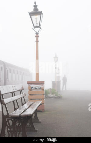 Kidderminster, UK. 24th February, 2019. UK weather: despite the thick morning fog across Worcestershire, nothing dampens the spirit of the dedicated volunteers at Severn Valley Railway and the misty morning provides an atmospheric and picturesque start to the day. Credit: Lee Hudson/Alamy Live News Stock Photo