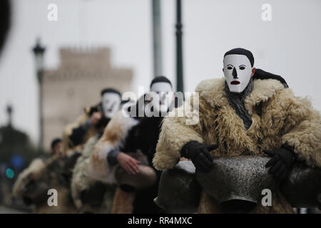 Thessaloniki, Greece. 24th Feb, 2019. Participants wearing traditional costumes march at the seafront of Thessaloniki. The Folklife and Ethnological Museum of Macedonia organized the fifth European assembly of bell bearers in Thessaloniki. The assembly took place in the context of the action ''Bell Roads'', which attempts to explore the customs of bell bearing in Europe. Credit: ZUMA Press, Inc./Alamy Live News Stock Photo