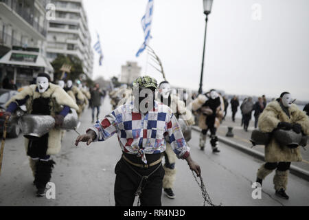 Thessaloniki, Greece. 24th Feb, 2019. Participants wearing traditional costumes dance as they march at the seafront of Thessaloniki. The Folklife and Ethnological Museum of Macedonia organized the fifth European assembly of bell bearers in Thessaloniki. The assembly took place in the context of the action ''Bell Roads'', which attempts to explore the customs of bell bearing in Europe. he Credit: ZUMA Press, Inc./Alamy Live News Stock Photo