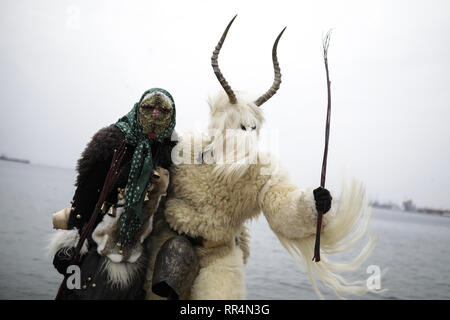 Thessaloniki, Greece. 24th Feb, 2019. People wearing traditional costumes take part at the ''Bell Roads'' festival. The Folklife and Ethnological Museum of Macedonia organized the fifth European assembly of bell bearers in Thessaloniki. The assembly took place in the context of the action ''Bell Roads'', which attempts to explore the customs of bell bearing in Europe. ' re Credit: ZUMA Press, Inc./Alamy Live News Stock Photo