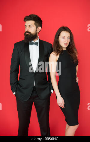 All black dress code. Official event concept. Man bearded wear tuxedo girl elegant dress. Visiting event or ceremony. Couple classy clothes. Elite event. Main rules picking clothes. Corporate party St...