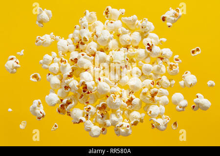 Close-Up Of Popcorn Against Yellow Background Stock Photo